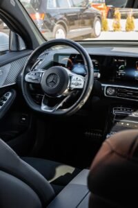 ll-electric Mercedes EQS executive transfer vehicle for Cambridge to Heathrow trips.